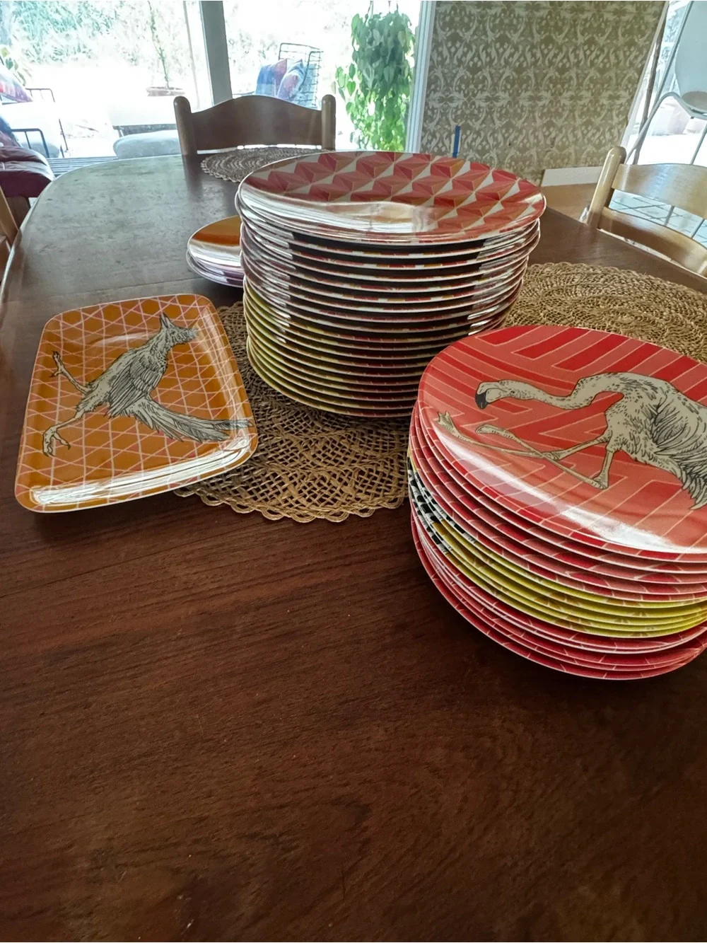 Set of 38 West Elm plates with colorful geometric prints & animal illustrations